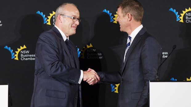 Labor leader Luke Foley, left, and Premier Mike Baird shake hands at the leaders' debate on Friday.