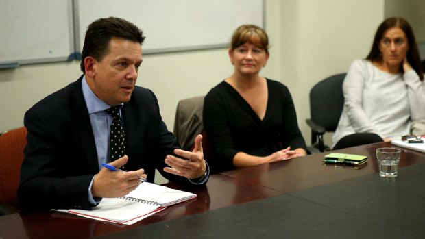 Senator Nick Xenophon meets with victims of bad financial advice to announce his policy.