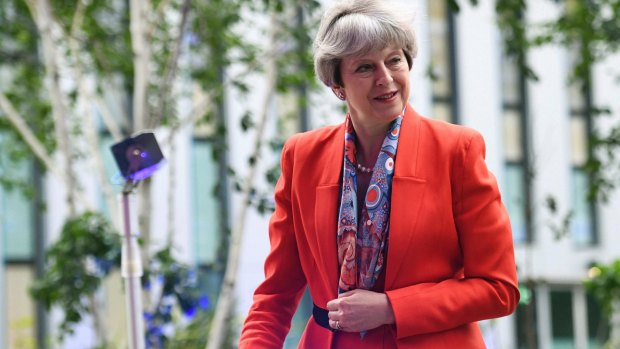 British Prime Minister Theresa May arrives at Sky studios to take part in a general election broadcast, in London on Monday