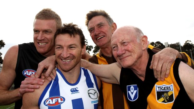 North Melbourne footballer Brent Harvey with '400-club' members Dustin Fletcher,  Michael Tuck and Kevin Bartlett.