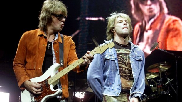 Richie Sambora (left) and Jon Bon Jovi performing together in 2001. 