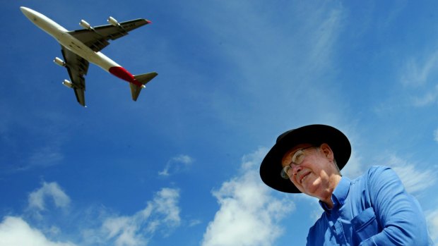 Ashfield Mayor Rae Jones as a Qantas aircraft takes off overhead from Sydney Airport, 2005. 