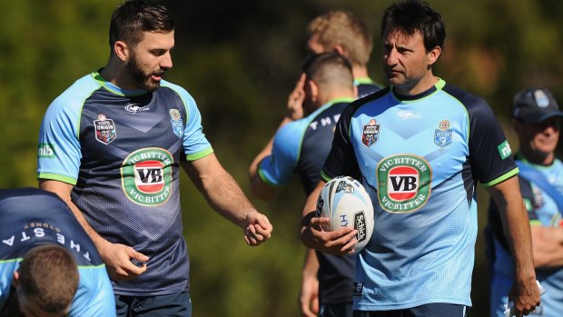 In the frame: Blues coach Laurie Daley, right, with Tigers NSW representative James Tedesco.