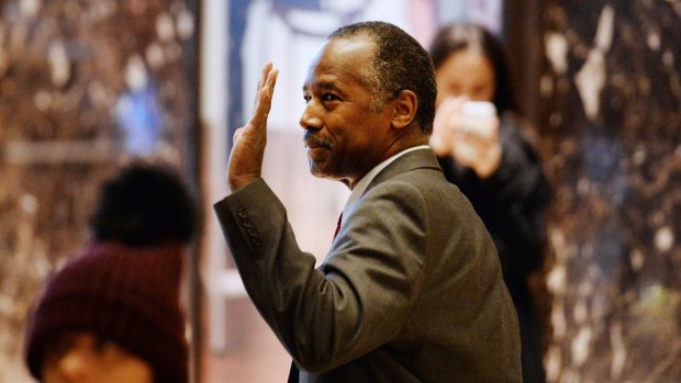 Retired neurosurgeon and former presidential candidate Ben Carson arrives at Trump Tower on Tuesday.
