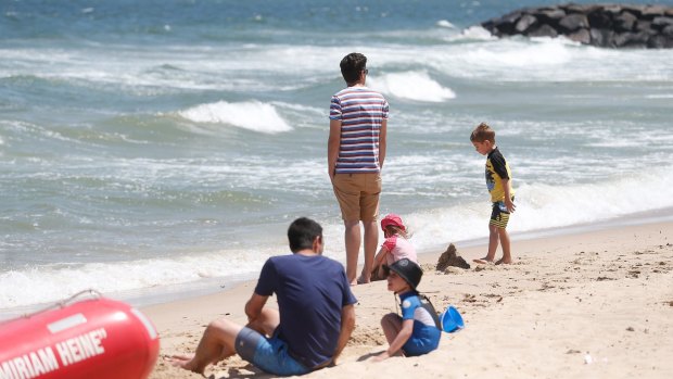 Beachgoers at Elwood stick to the sand. 