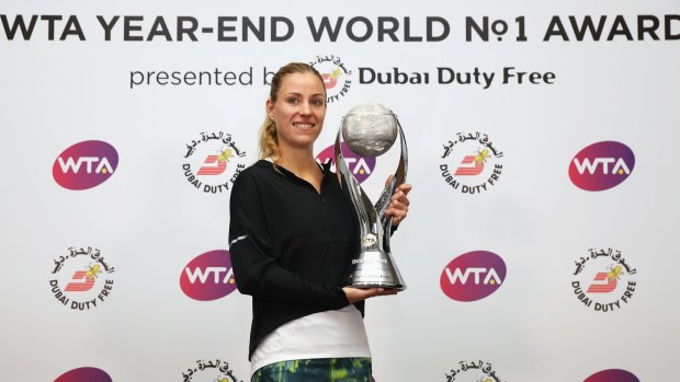 Angelique Kerber picking up her end-of-year World No.1 trophy.