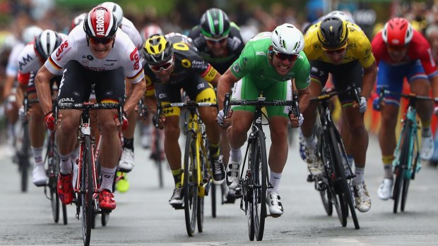 Team Dimension Data's Mark Cavendish beats Lotto-Soudal's Andre Greipel in a photo finish in Angers.