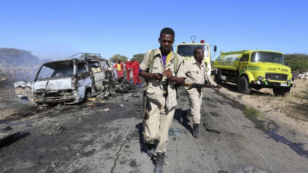 Somali soldiers after an al-Shabaab suicide car bomb targeted peacekeepers outside Mogadishu last year. Friday's attack is the latest in a series of attacks on government officials and international peacekeepers in Somalia.