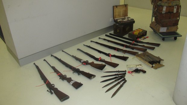Police found rifles, shotguns and more than 8000 rounds of ammunition at the man's home.