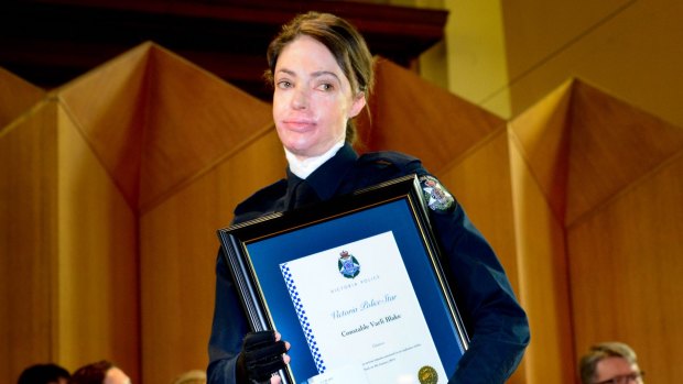 Photo by Penny Stephens. The Age. Constable Varli Blake receives a Victoria Police Star.