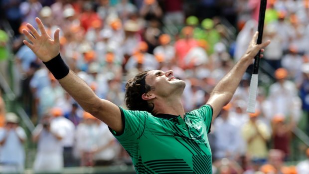 Roger Federer celebrates after beating Rafael Nadal. 
