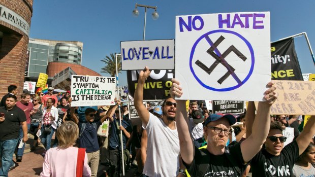 Demonstrators in Los Angeles decry hatred and racism. 
