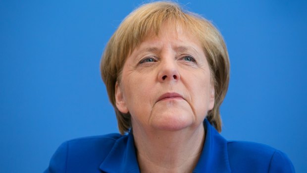 German Chancellor Angela Merkel defends her refugee policy following renewed criticism in the wake of violent attacks in Germany.