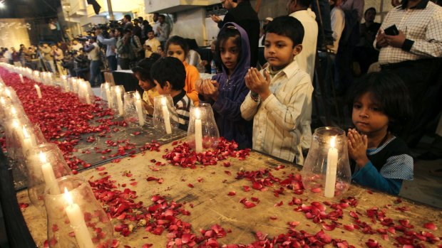 Pakistani children remember the students who were killed by militants in Peshawar last year. 