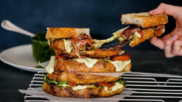 Caprese toasted sandwich with homemade pesto and onion jam. 