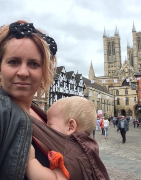 Holly Zwaif travelling in the UK with her child. 