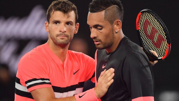 Grigor Dimitrov and Nick Kyrgios meed mid-court after their fourth round clash.