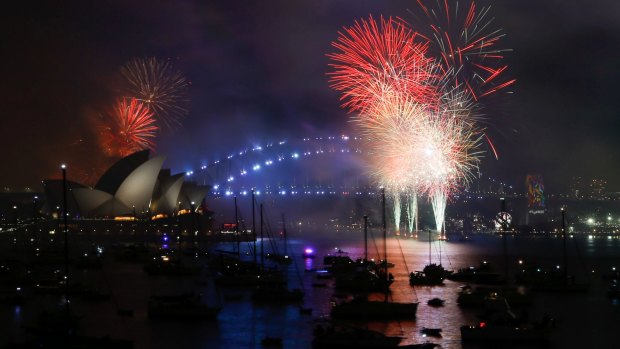 The midnight New Year's Eve fireworks over Sydney Harbour, viewed from Mrs Macquarie's Point in Sydney.