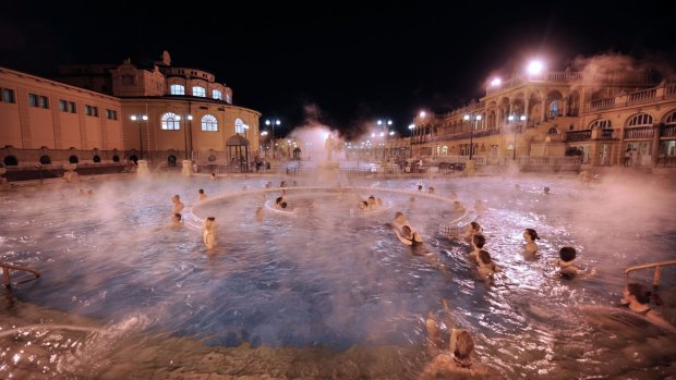 Steam rising off the Szechenyi Baths on a cold winter night in Budapest, Hungary.