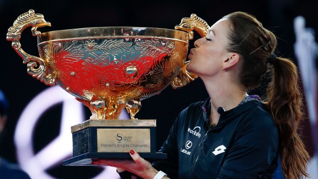 Trophy moment: World number three Agnieszka Radwanska celebrates her win.