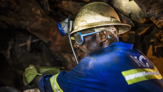 A copper ore miner in Zambia: Antofagasta sees the glut in the red metal lasting for another two years.