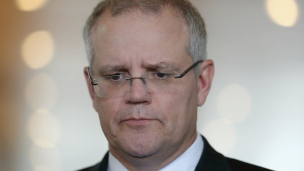 Treasurer Scott Morrison's delays over a return to surplus has prompted credit ratings agency S&P to put the nation's top-notch rating 'on watch'.
