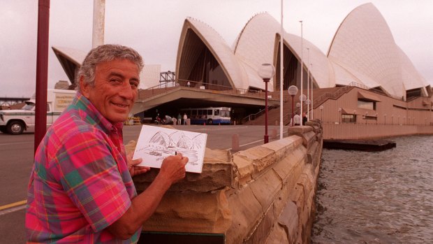 Tony Bennett does a quick sketch of the Opera House before a concert in Sydney in 1995.