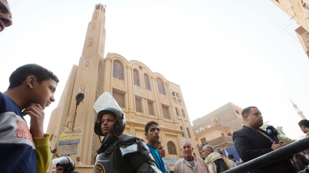 Police surround Mar Mina church, in Helwan, Cairo, Egypt, on December 29.