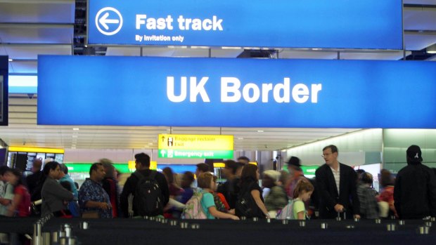 Passengers going through the UK Border at Terminal 2 of Heathrow Airport. 