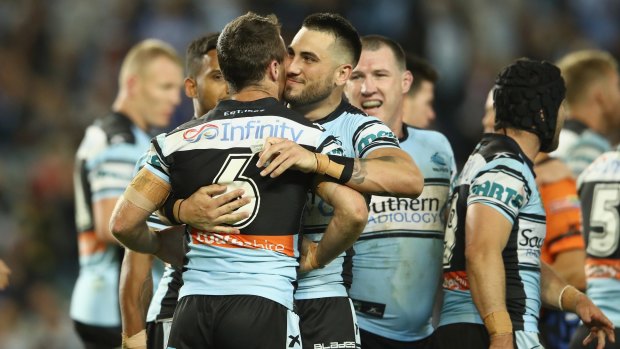 Into the decider: James Maloney and Jack Bird celebrate on Friday night.