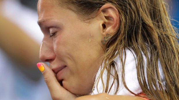Russia's Yulia Efimova cries after placing second in the women's 100m breaststroke final. 