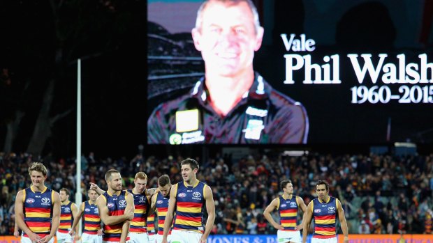 Adelaide players paid tribute to coach Phil Walsh last July.