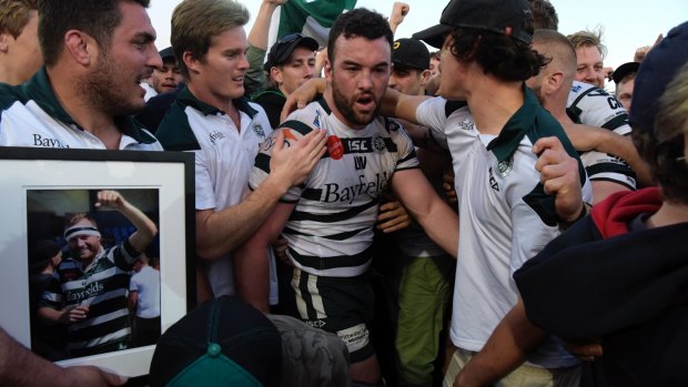 Emotional: Warringah remember Lachlan Ward after winning the Shute Shield.