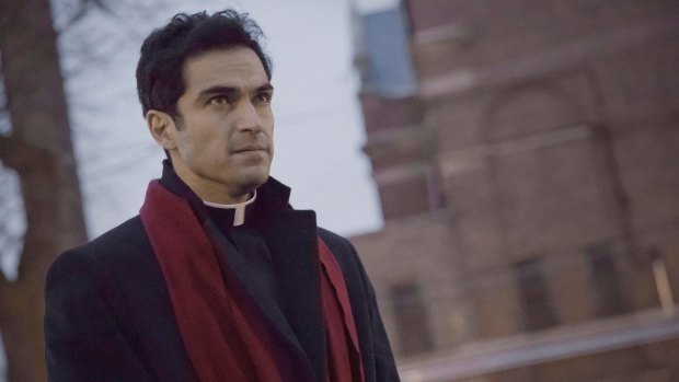 Alfonso Herrera as Father Tomas Ortega in The Exorcist.