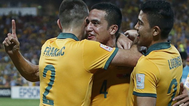 Aiming for the top: Tim Cahill with Ivan Franjic and Massimo Luongo, three Socceroos who could play key roles against the UAE.