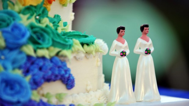 In the US, a baker has been prosecuted for refusing to put a slogan on a wedding cake.