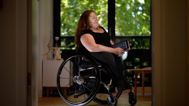 Bree Synot in her disability-friendly home in Abbotsford. Using her ipad, she can open the front door to visitors from wherever she is in the house - or even outside it.