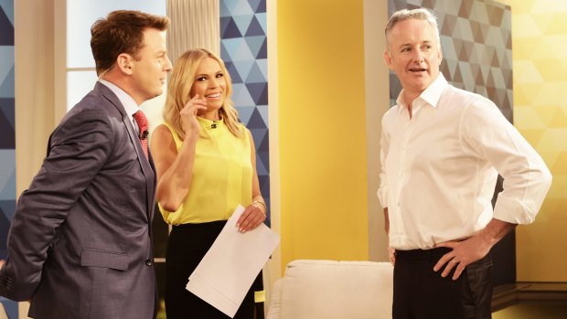 Wary of deal fever: Hugh Marks, CEO of Nine Entertainment on set with Mornings presenters (left) Ben Fordham and (centre) Sonia Kruger.