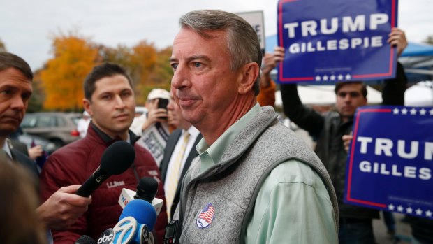 Republican candidate for Virginia governor Ed Gillespie pauses while speaking with reporters after voting at his polling place.