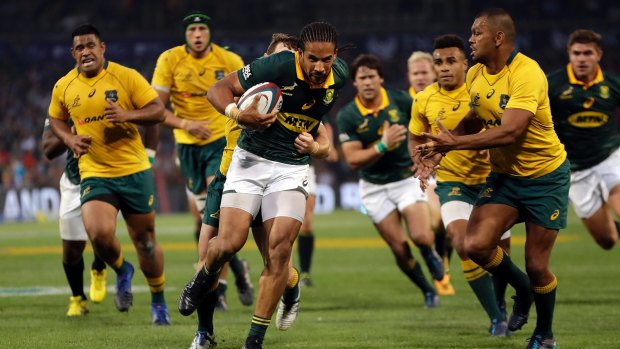 On the run: South Africa's Courtnall Skosan attacks during the Rugby Championship match against Australia in Bloemfontein.