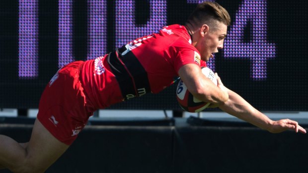 RC Toulon's winger James O'Connor dives to score a try during the French Top 14 rugby union in September.