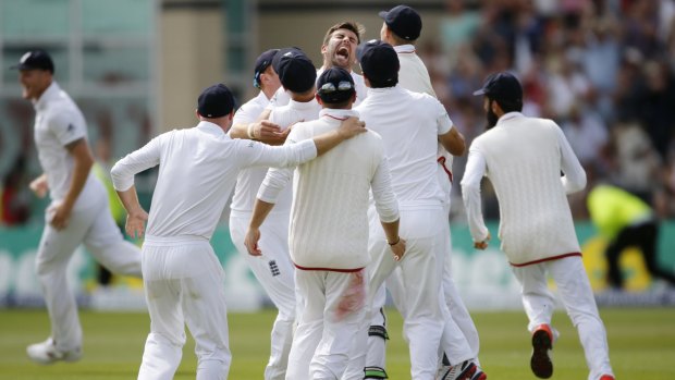 The moment: England's Mark Wood takes the wicket of Nathan Lyon.
