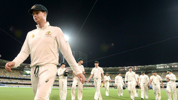 Possibly the wrong choice: Steve Smith leads his men off the field and the end of the extended half hour of play on day four.