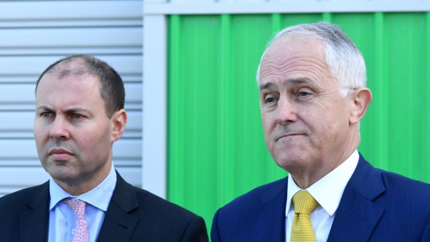 Prime Minister Malcolm Turnbull (right) and Energy Minister Josh Frydenberg are trying to ramp up pressure on the states to support the national energy guarantee.