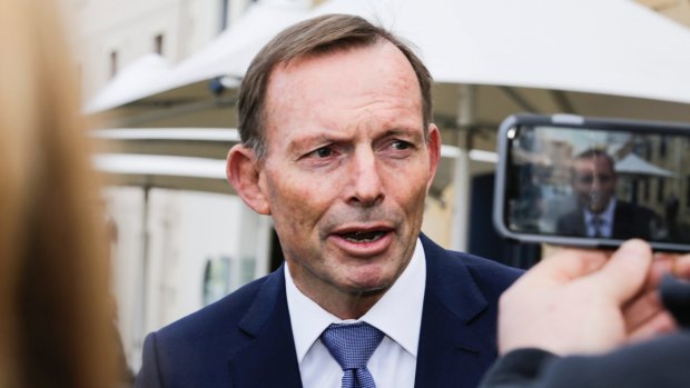 Former prime minister Tony Abbott on the hustings in Tasmania. 