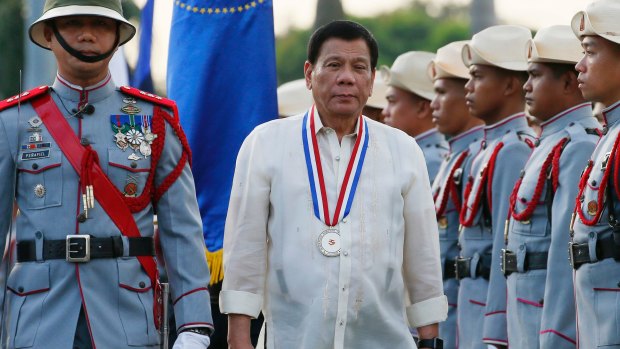 Philippine President Rodrigo Duterte, centre, said his war on drugs will continue for his entire term.