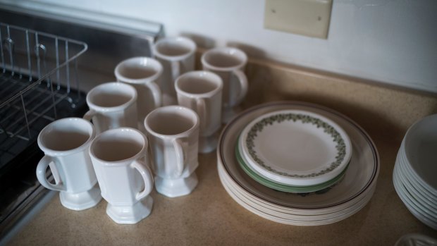 Cups and plates await the new owners of the home.