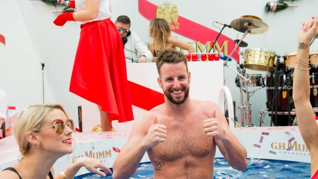 Olympic swimmer James Magnussen takes a dip in the Mumm marquee on Melbourne Cup Day, 2016.