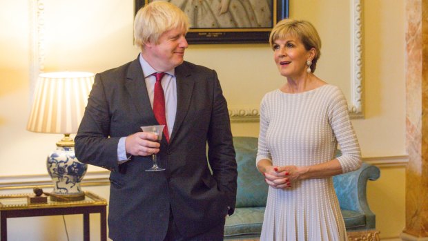 Boris Johnson listens as Julie Bishop speaks at 10 Downing Street on Thursday.