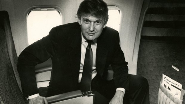 Donald Trump in the seat of one of his Trump Shuttle planes in 1989. 